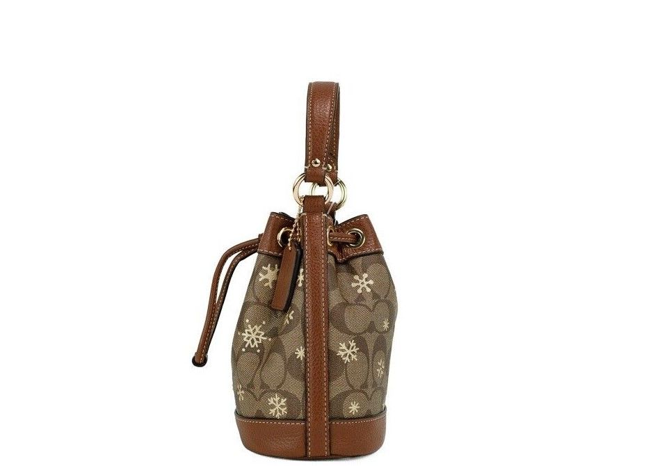 COACH Dempsey 15 Small Snowflake Print Khaki Coated Canvas Bucket Bag