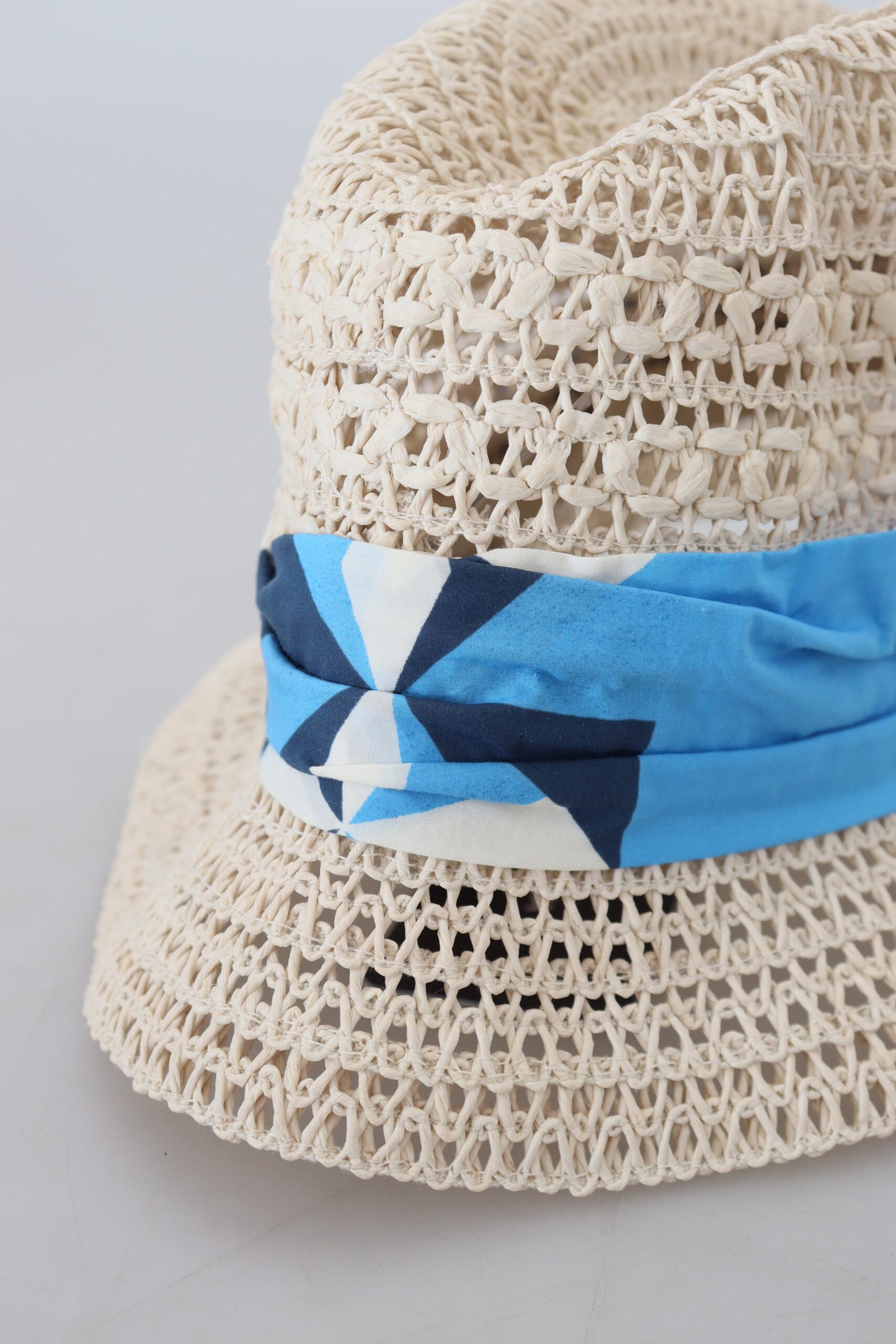 Dolce & Gabbana Elegant Beige Bucket Hat with Blue Bow Accent