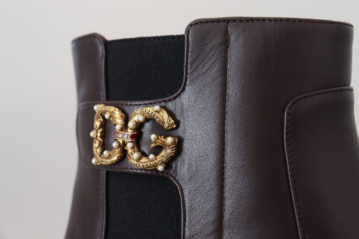 Dolce & Gabbana Elegant Brown Ankle Boots with Gold Pearl Detail