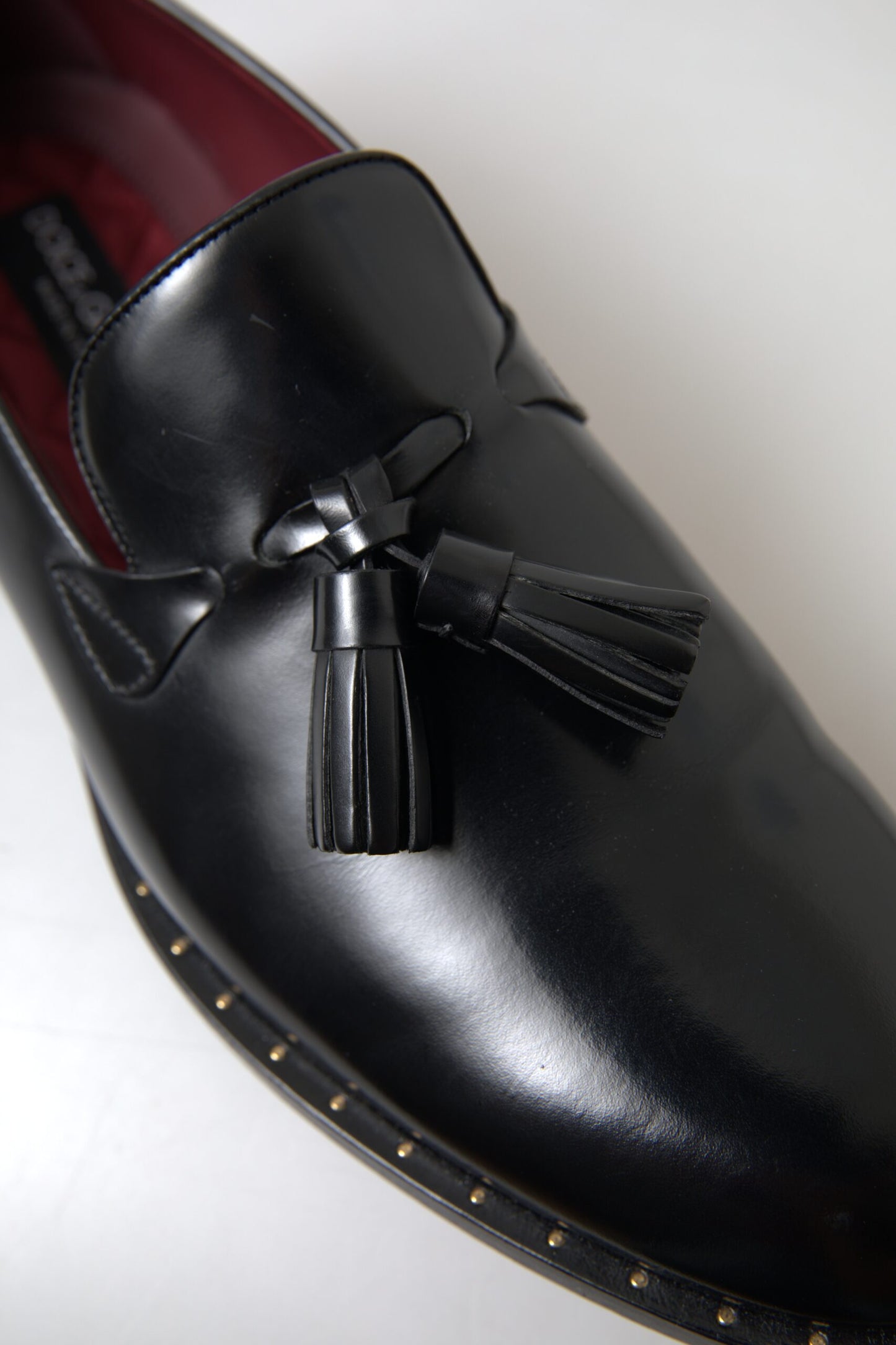 Dolce & Gabbana Elegant Black Gold Tassel Leather Loafers