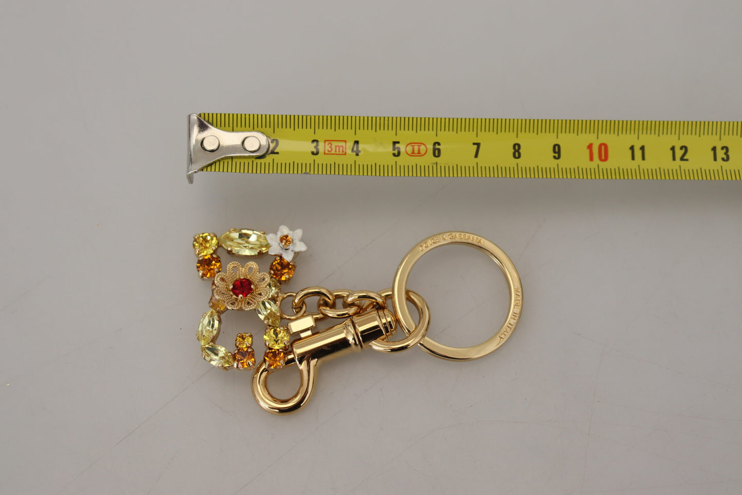 Dolce & Gabbana Elegant Gold-Toned Crystal Keychain