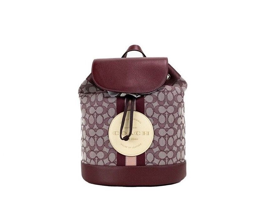 COACH Dempsey Wine Multi Signature Jacquard Canvas Logo Patch Backpack